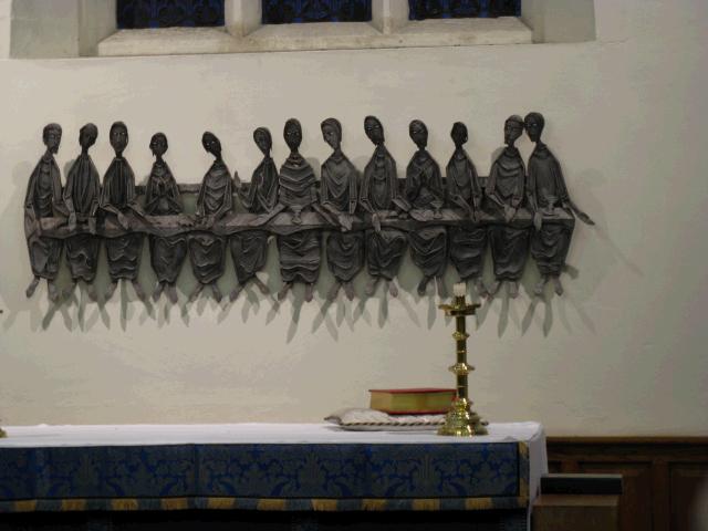 representation of the last supper behind the altar 